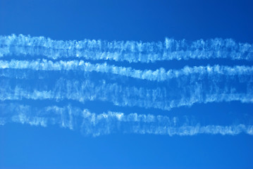 Image showing Smoke traces in blue sky