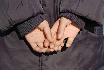 Image showing Hands on back
