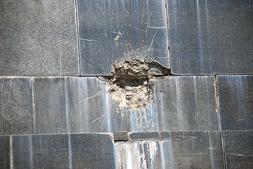 Image showing Hit over marble wall