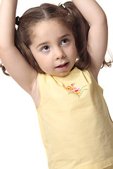 Image showing Toddler girl arms above head