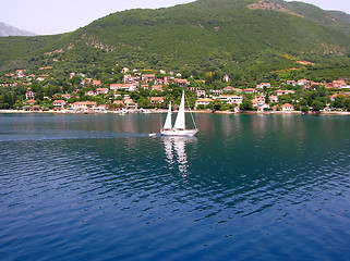 Image showing Sailing boat over blue water