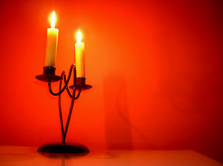 Image showing Candles over orange