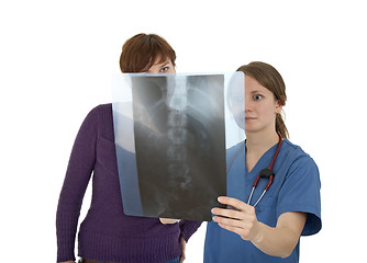 Image showing Nurse and patient looking at x-ray with worried expression