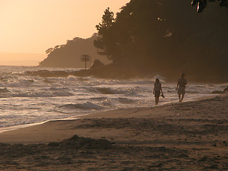 Image showing Couple Walking Down the Beach