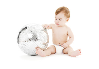 Image showing adorable baby boy with big disco ball