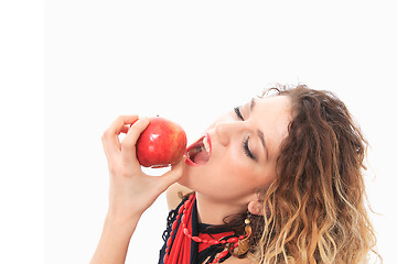 Image showing woman eating a red apple.