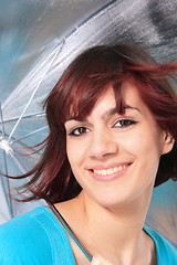 Image showing beautiful girl under an umbrella 