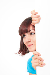 Image showing Beautiful woman holding empty white board