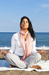 Image showing Young native american woman meditating