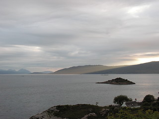 Image showing sun through the hills