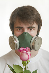 Image showing young man in respirator mask 