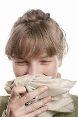 Image showing Girl using  handkerchief while sneezing