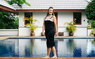 Image showing Woman by the pool.