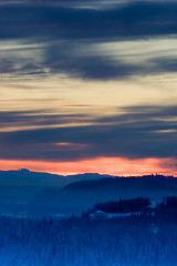 Image showing Winter sunset with blurred horizon, vertical