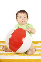 Image showing Baby, Beach towell and ball