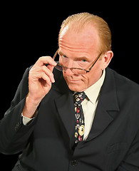 Image showing Businessman Looking Over Glasses