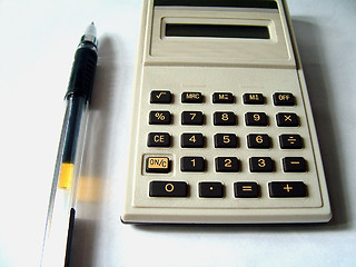 Image showing Ball pen and calculator