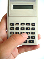 Image showing The use of calculator