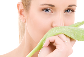 Image showing woman with green leaf