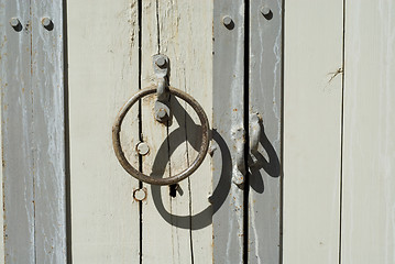 Image showing wooden door with handles