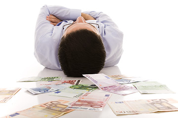 Image showing Sleeping with the money