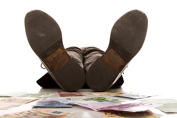 Image showing Sleeping with the money