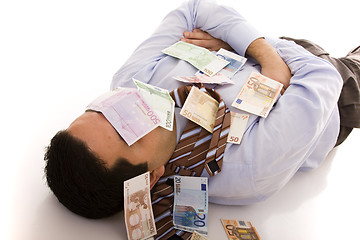 Image showing Sleeping with the money
