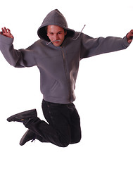 Image showing Young male dancer makes a jump