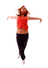 Image showing attractive teenage dancing over white background