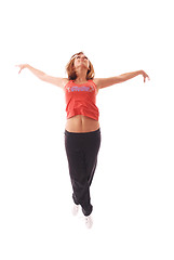 Image showing attractive teenage dancing over white background