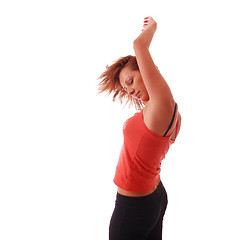 Image showing attractive teenage dancing over white background