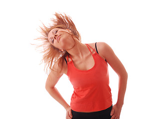 Image showing attractive teenage dancing over white background