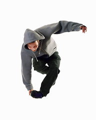 Image showing Young male dancer makes a jump