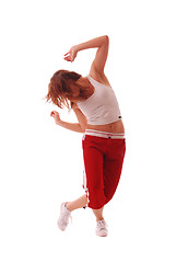 Image showing attractive teenage dancing over white background