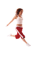 Image showing attractive teenage dancing over white background