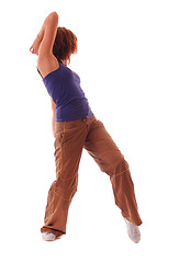 Image showing attractive teenage dancing over white background