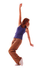 Image showing attractive teenage dancing over white background