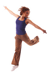 Image showing attractive teenage dancing over white background