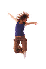 Image showing attractive teenage dancing over white background