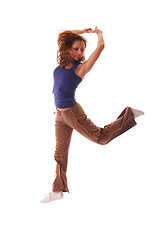 Image showing attractive teenage dancing over white background