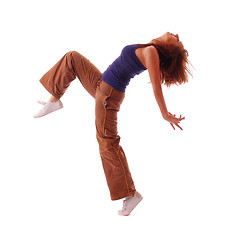 Image showing attractive teenage dancing over white background