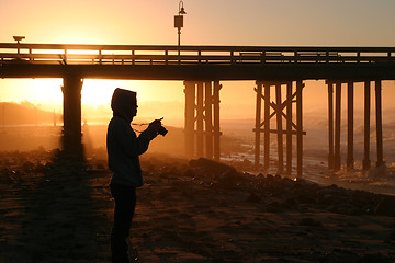 Image showing Photographer At Sunset