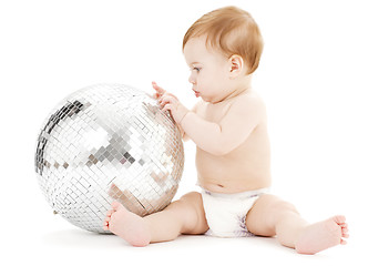 Image showing adorable baby boy with big disco ball