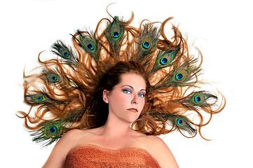 Image showing Redhead With Peacock Feathers in Her Hair on White Background