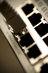 Image showing Network cable connected to a switch