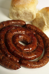 Image showing Boerewors sausage and bread rolls