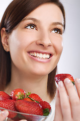 Image showing Eating strawberry