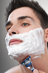 Image showing Man shaving