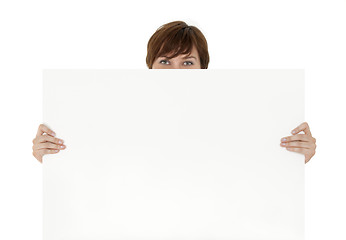 Image showing Smiling eyes behind a blank banner ad