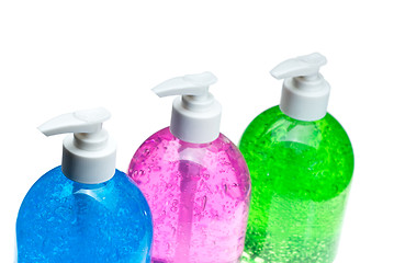 Image showing hair gel bottles over white